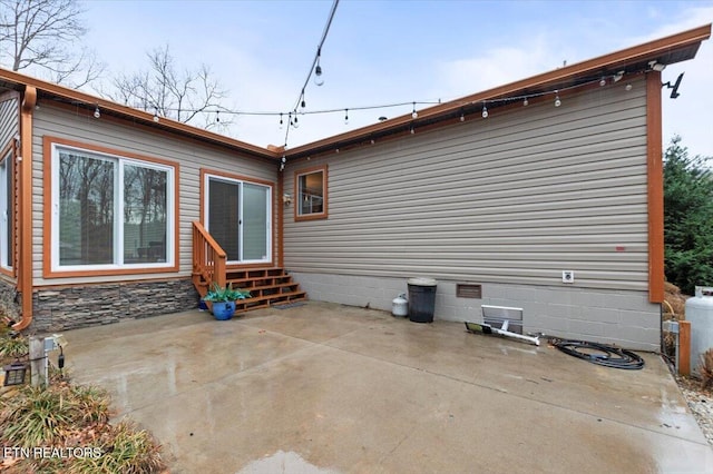 back of house featuring a patio area