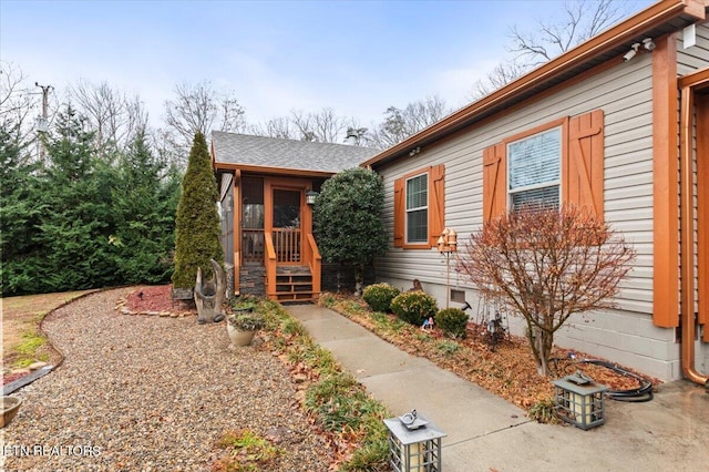 view of front of house with a sunroom