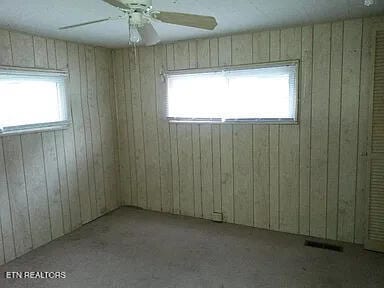 spare room featuring ceiling fan