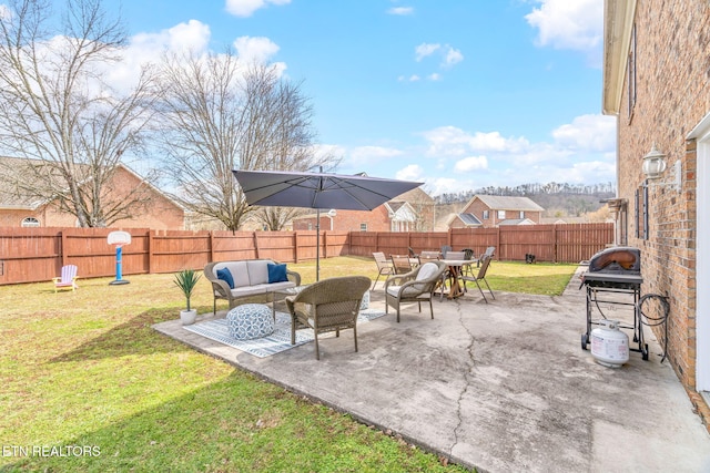 view of patio featuring an outdoor hangout area and a fenced backyard