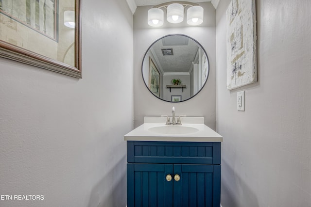 bathroom featuring vanity and a textured ceiling