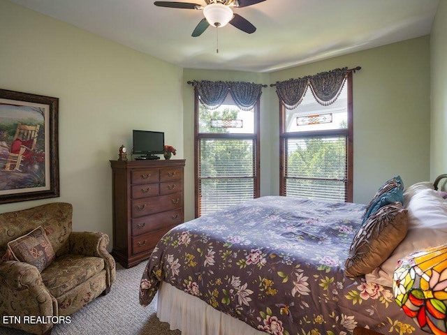 bedroom featuring ceiling fan and carpet flooring