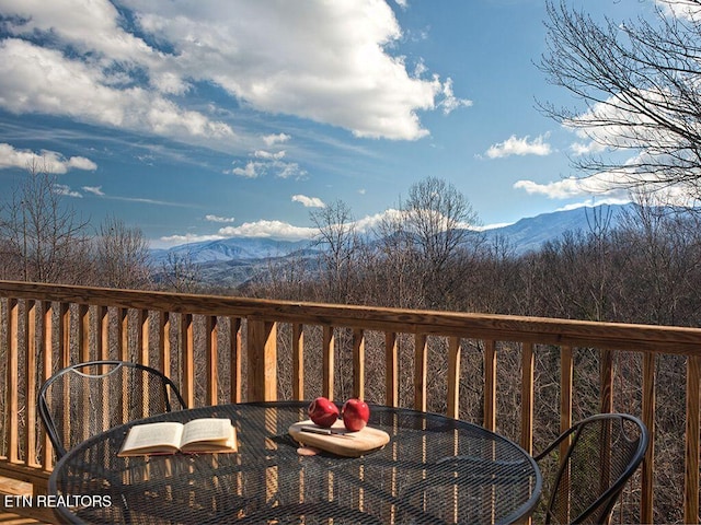 balcony featuring a mountain view