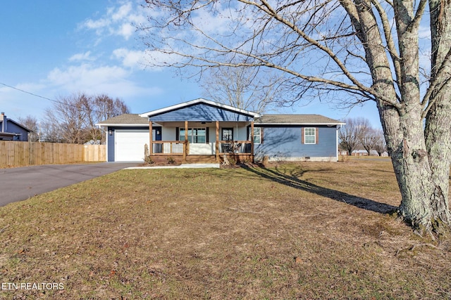 single story home with a porch, a garage, and a front lawn