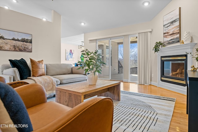 living room with light hardwood / wood-style floors