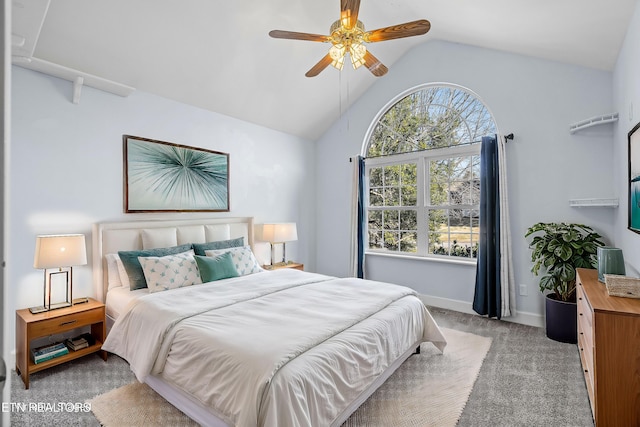 bedroom featuring ceiling fan, light colored carpet, lofted ceiling, and multiple windows