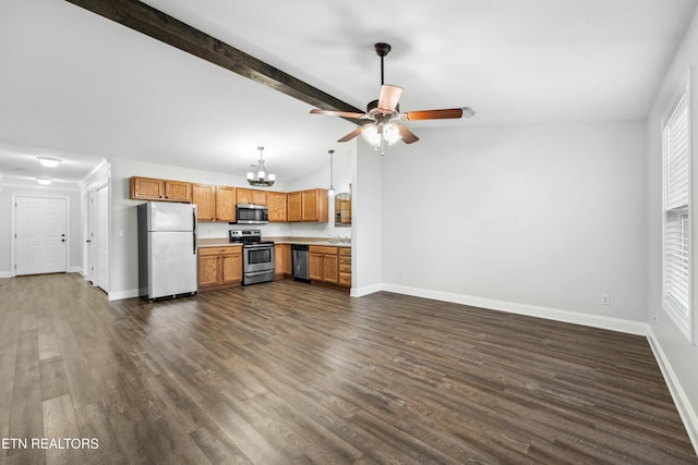 kitchen featuring sink, lofted ceiling with beams, dark hardwood / wood-style floors, stainless steel appliances, and ceiling fan with notable chandelier