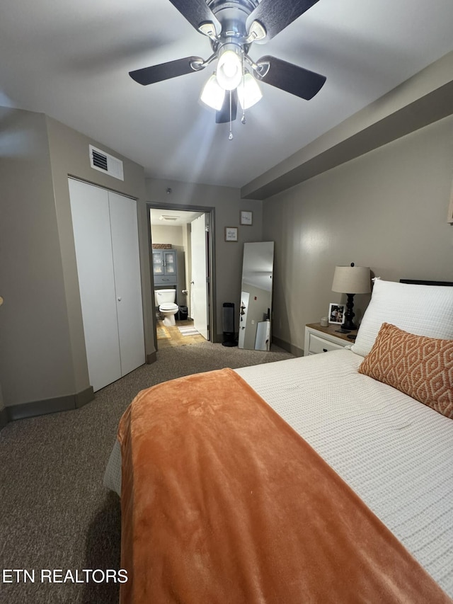 carpeted bedroom featuring ceiling fan and a closet