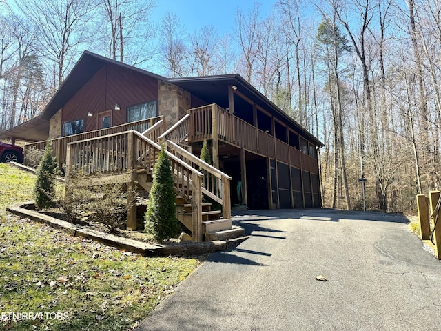 view of front of property featuring stairs