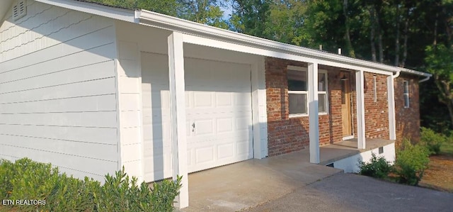 exterior space with a garage