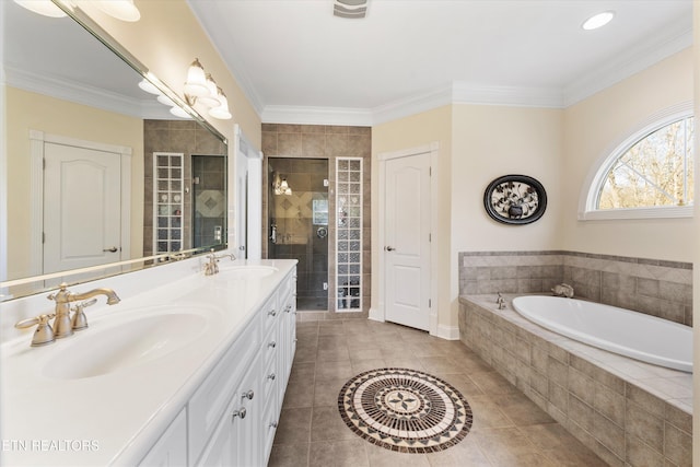 bathroom with ornamental molding, shower with separate bathtub, tile patterned flooring, and vanity