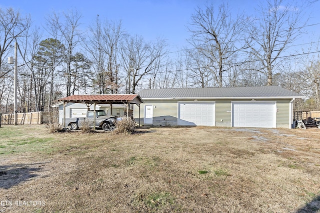 exterior space featuring a lawn and a carport