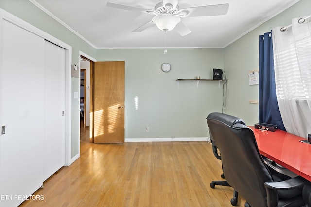 office featuring ornamental molding, ceiling fan, and light hardwood / wood-style floors