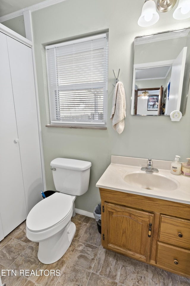 bathroom with vanity and toilet