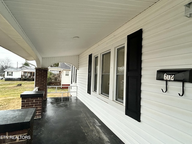 view of patio featuring a porch