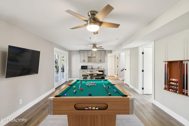 game room featuring ceiling fan, billiards, and wood-type flooring