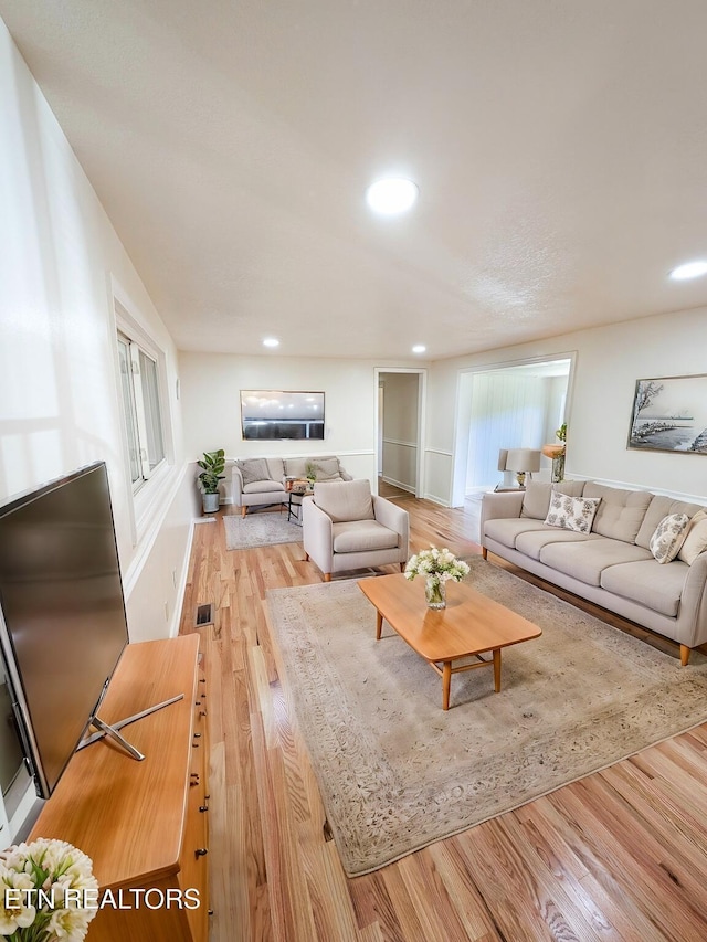 living room featuring light hardwood / wood-style floors