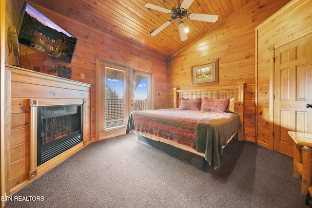 bedroom featuring vaulted ceiling, wooden walls, dark colored carpet, access to exterior, and wooden ceiling