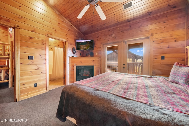 bedroom with vaulted ceiling, wood walls, access to outside, wood ceiling, and french doors