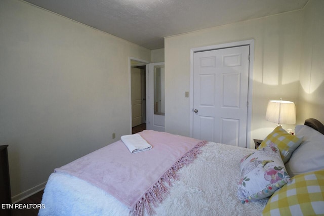 bedroom with a textured ceiling