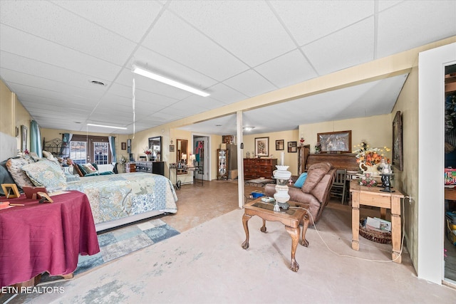 bedroom with a drop ceiling