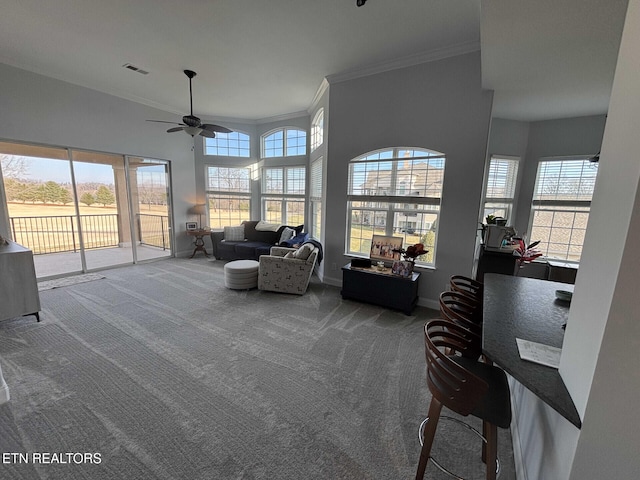 interior space featuring a wealth of natural light and ceiling fan