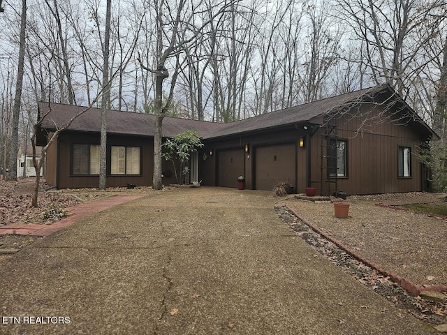 ranch-style home with a garage