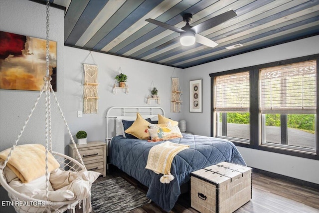 bedroom with wood-type flooring