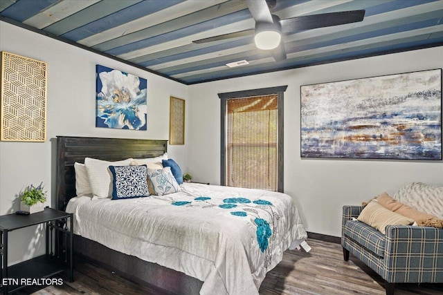 bedroom with hardwood / wood-style flooring and ceiling fan