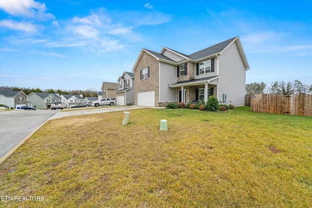 front facade with a garage and a front yard