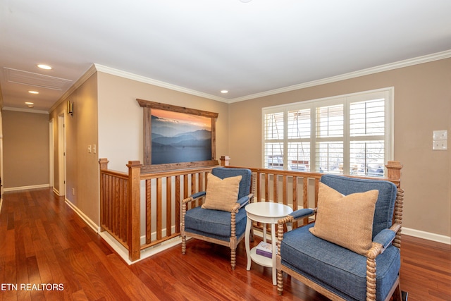 living area with crown molding and dark wood-type flooring