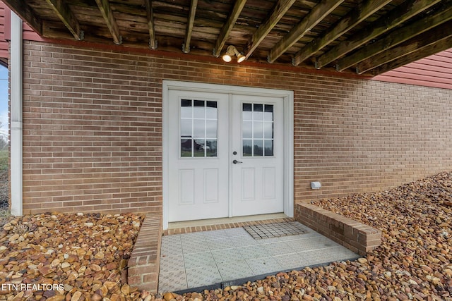 property entrance featuring french doors