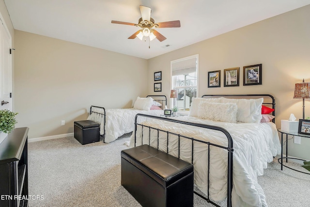 bedroom with light colored carpet and ceiling fan