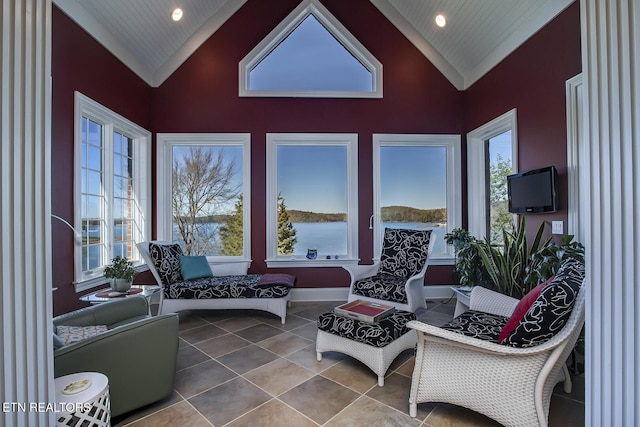 sunroom / solarium with lofted ceiling