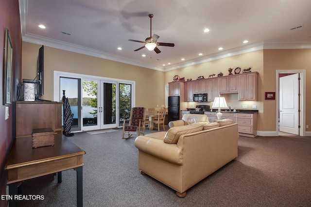 carpeted living room featuring crown molding, ceiling fan, and french doors