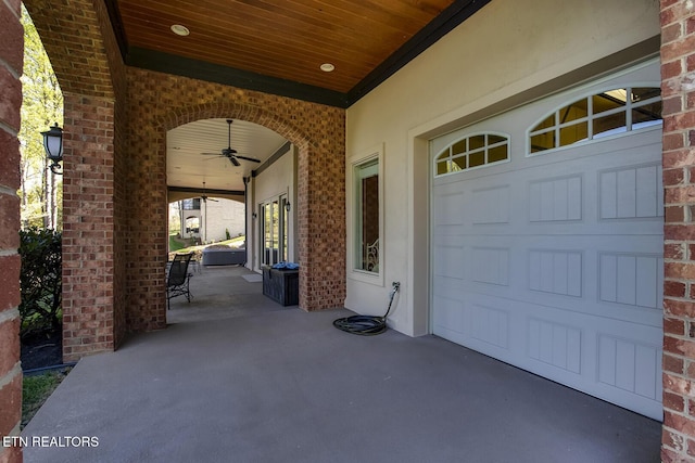 view of patio featuring ceiling fan