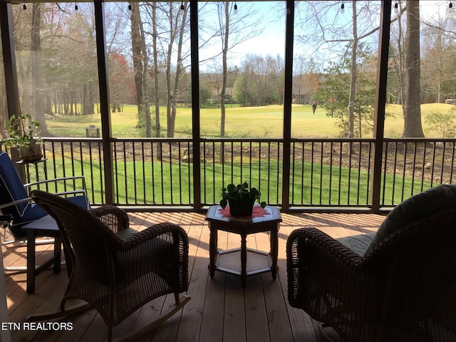 sunroom with a healthy amount of sunlight