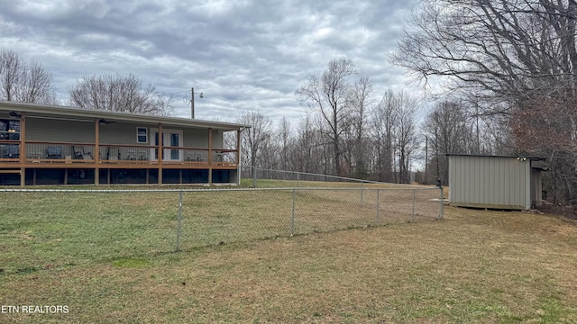 view of yard with a wooden deck