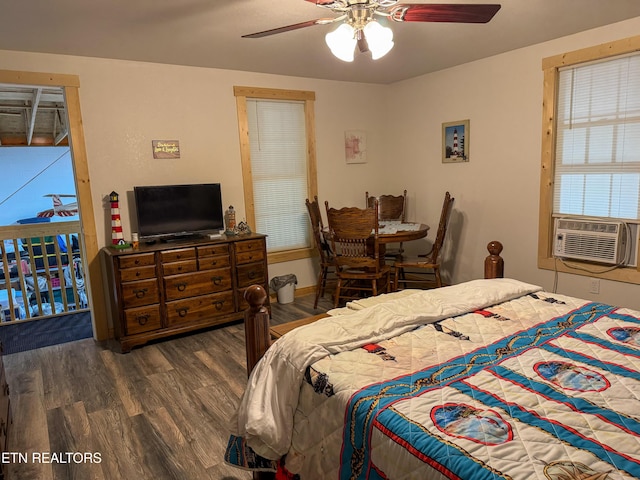 bedroom featuring cooling unit, ceiling fan, and dark hardwood / wood-style flooring