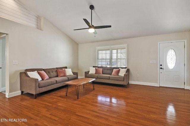 living room featuring high vaulted ceiling, wood finished floors, baseboards, and ceiling fan
