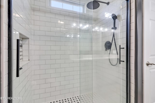 full bathroom featuring a stall shower