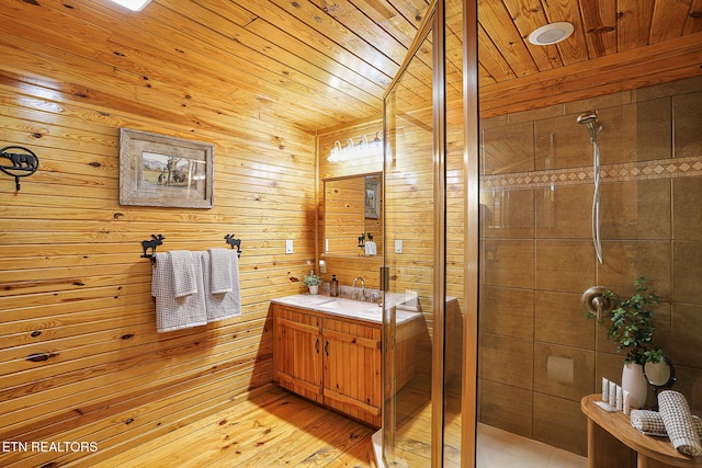 bathroom with vanity, wood ceiling, a shower with door, and hardwood / wood-style flooring