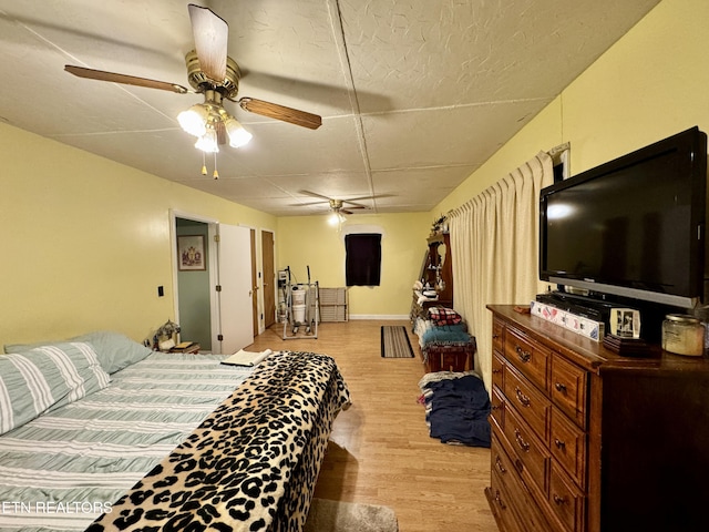 bedroom with light hardwood / wood-style floors