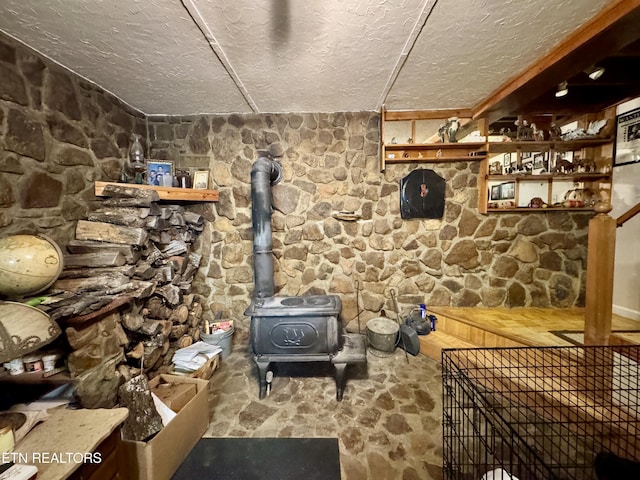 interior space with a wood stove