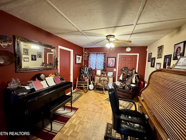 miscellaneous room featuring light parquet floors and ceiling fan