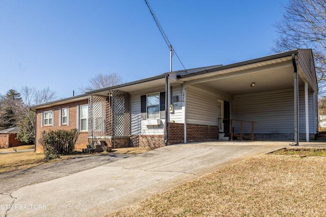 view of front of home with a carport