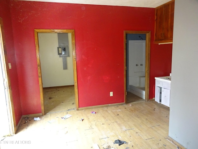 spare room featuring light hardwood / wood-style flooring