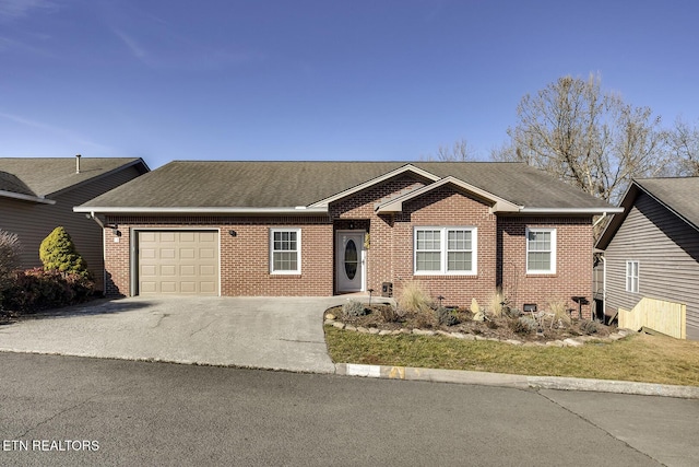 ranch-style house featuring a garage