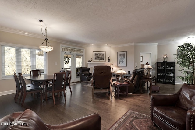 dining room featuring dark hardwood / wood-style flooring, crown molding, and a textured ceiling