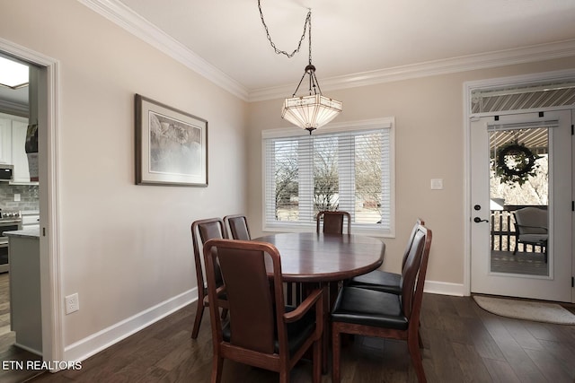 dining space with dark wood-type flooring and ornamental molding